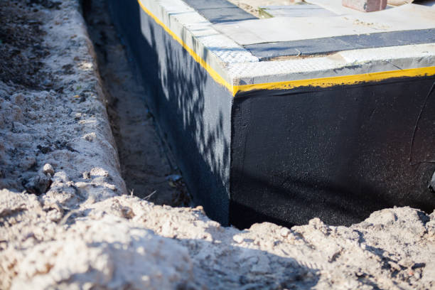 Professional Emergency Waterproofing technician working in Milledgeville, IL